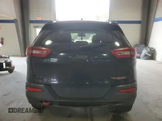2014 Jeep Cherokee Trailhawk with VIN 1C4PJMBB8EW171116, listed as a Copart auction lot 60107215 with 168,979 mi miles and Salvage title. Bid and sale history available at DreamBid. Image 6.