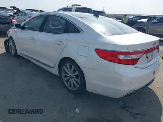 2015 Hyundai Azera Limited with VIN KMHFH4JG7FA476458, listed as a IAAI auction lot 41893979 with 149,114 mi miles and . Bid and sale history available at DreamBid. Image 3.