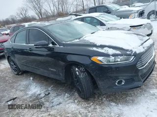 2013 Ford Fusion SE Hybrid with VIN 3FA6P0LU0DR176353, listed as a IAAI auction lot 41591238 with 190,717 mi miles. Bid and sale history available at carsss.com. Image 13.
