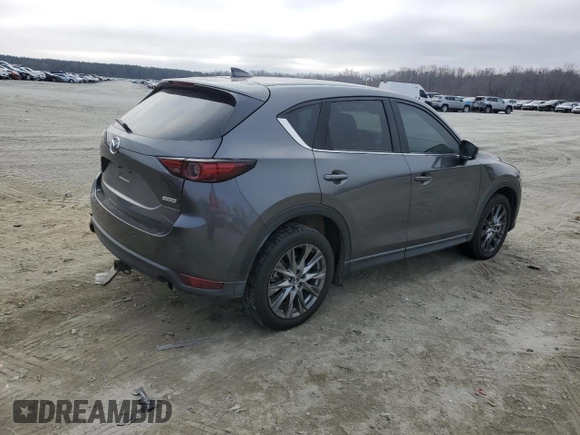 2019 Mazda CX-5 Signature with VIN JM3KFBEY3K0609305, listed as a Copart auction lot 44146455 with 33,104 mi miles and Salvage Title. Bid and sale history available at carsss.com. Image 3.