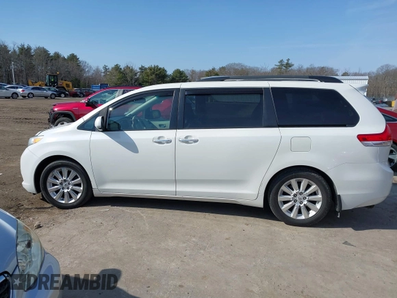 2011 Toyota Sienna XLE AAS with VIN 5TDYK3DC7BS054012, listed as a IAAI auction lot 41752182 with 123,226 mi miles and . Bid and sale history available at DreamBid. Image 14.