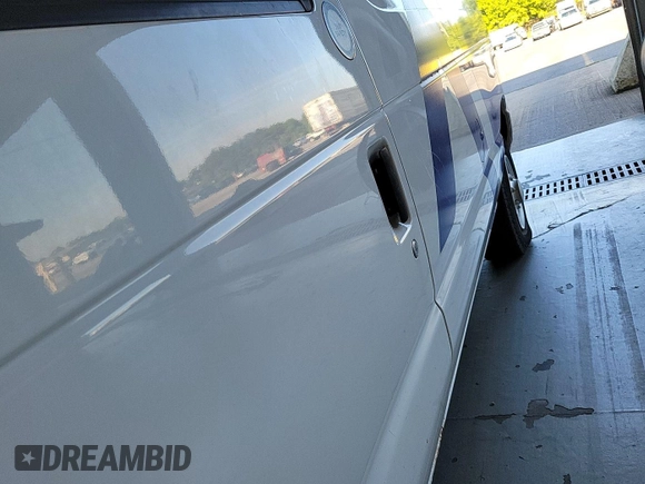 2012 Ford Econoline Cargo Commercial with VIN 1FTNE2EL9CDB21032, listed as a IAAI auction lot 42787135 with 106,406 mi miles and . Bid and sale history available at DreamBid. Image 2.