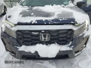 2025 Honda Passport EX-L z VIN 5FNYF8H55SB005439, wystawiony jako Copart lot #87375214 z przebiegiem 2575 mil mil oraz Szkody całkowita. Historia ofert i sprzedaży dostępna na DreamBid. Obrazek 12.