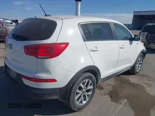 2015 Kia Sportage LX with VIN KNDPBCAC8F7690843, listed as a IAAI auction lot 41813154 with 124,885 mi miles and . Bid and sale history available at carsss.com. Image 4.