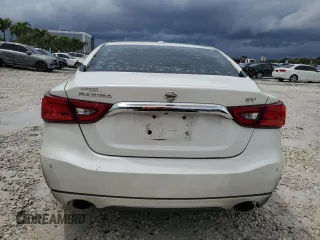 2017 Nissan Maxima SV with VIN 1N4AA6APXHC446995, listed as a Copart auction lot 51633115 with 56,949 mi miles and Salvage Title. Bid and sale history available at DreamBid. Image 6.