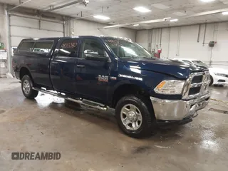 2015 Ram 2500 Tradesman z VIN 3C6TR5HTXFG605539, wystawiony jako IAAI lot #41833380 z przebiegiem 103 921 mil mil oraz . Historia ofert i sprzedaży dostępna na DreamBid. Obrazek 1.