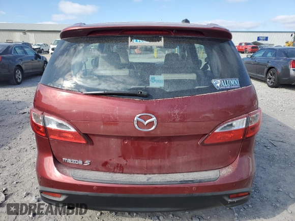 2015 Mazda 5 Grand Touring z VIN JM1CW2DL9F0182785, wystawiony jako Copart lot #83183274 z przebiegiem 71 725 mil mil oraz Szkoda całkowita • Salvage title. Historia ofert i sprzedaży dostępna na DreamBid. Obrazek 6.