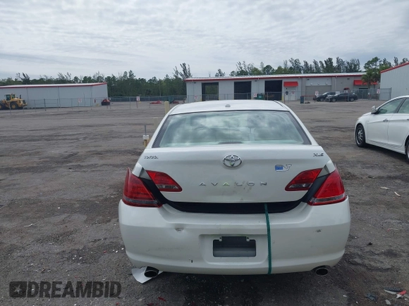 2010 Toyota Avalon XL with VIN 4T1BK3DB8AU354533, listed as a IAAI auction lot 41802797 with 117,956 mi miles and . Bid and sale history available at carsss.com. Image 6.