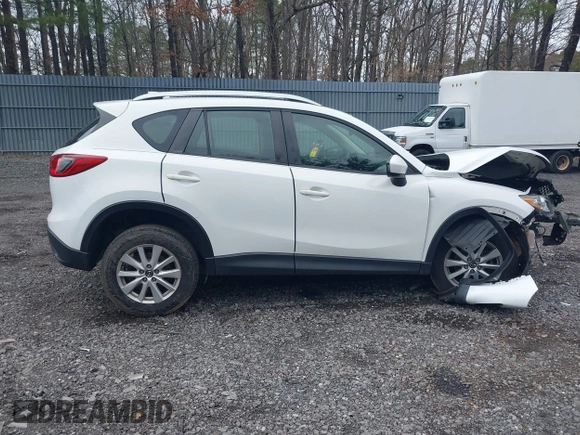 2014 Mazda CX-5 Sport with VIN JM3KE4BE3E0300849, listed as a IAAI auction lot 41942418 with 144,310 mi miles. Bid and sale history available at carsss.com. Image 13.