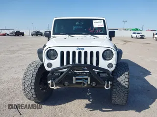 2014 Jeep Wrangler Unlimited Rubicon with VIN 1C4BJWFG1EL167423, listed as a IAAI auction lot 41861109 with 104,669 mi miles. Bid and sale history available at carsss.com. Image 12.
