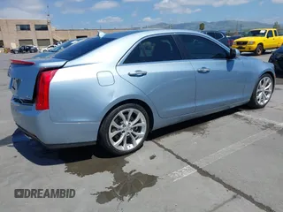 2013 Cadillac ATS Premium with VIN 1G6AE5S31D0152694, listed as a IAAI auction lot 42127294 with 71,882 mi miles. Bid and sale history available at carsss.com. Image 4.