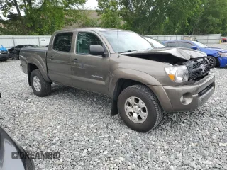 2011 Toyota Tacoma with VIN 3TMLU4EN8BM062971, listed as a Copart auction lot 60919195 with 219,061 mi miles and Clean title. Bid and sale history available at DreamBid. Image 4.