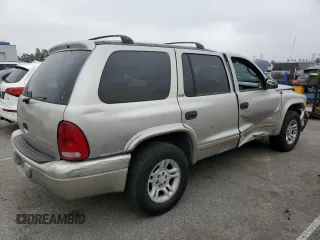 2002 Dodge Durango with VIN 1B4HR48N82F100912, listed as a Copart auction lot 58509495 with 195,039 mi miles and Salvage title. Bid and sale history available at DreamBid. Image 3.