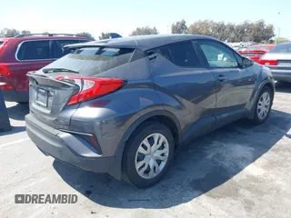 2021 Toyota C-HR LE with VIN JTNKHMBX0M1126776, listed as a IAAI auction lot 41955661 with 81,272 mi miles. Bid and sale history available at carsss.com. Image 4.