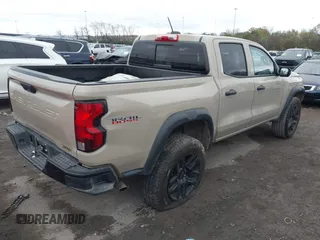 2023 Chevrolet Colorado 4WD Trail Boss with VIN 1GCPTEEK8P1239877, listed as a IAAI auction lot 40893691 with 30,617 mi miles. Bid and sale history available at carsss.com. Image 4.