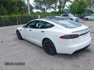 2022 Tesla Model S Plaid with VIN 5YJSA1E61NF460155, listed as a IAAI auction lot 42545167 with 51,711 mi miles and . Bid and sale history available at DreamBid. Image 3.