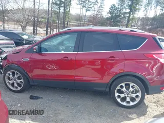 2016 Ford Escape Titanium with VIN 1FMCU0J93GUB11073, listed as a IAAI auction lot 41751349 with 92,000 mi miles. Bid and sale history available at carsss.com. Image 14.