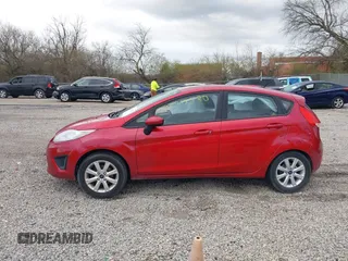 2011 Ford Fiesta SE with VIN 3FADP4EJ9BM216456, listed as a IAAI auction lot 41918530 with 165,989 mi miles. Bid and sale history available at carsss.com. Image 14.