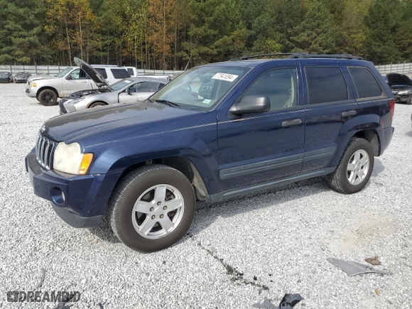2005 Jeep Grand Cherokee Laredo with VIN 1J4HS48N75C724594, listed as a Copart auction lot 77941094 with 0 mi miles and Salvage Title. Bid and sale history available at carsss.com. Image 1.