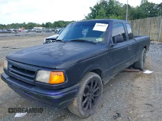 1994 Ford Ranger Splash z VIN 1FTCR14U9RTA81159, wystawiony jako IAAI lot #42659217 z przebiegiem 300 000 mil mil oraz . Historia ofert i sprzedaży dostępna na DreamBid. Obrazek 2.