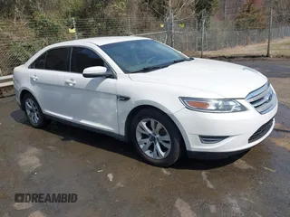 2012 Ford Taurus SEL with VIN 1FAHP2EW9CG121263, listed as a IAAI auction lot 41785838 with 185,433 mi miles and . Bid and sale history available at carsss.com. Image 1.