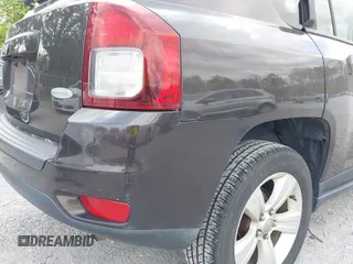 2014 Jeep Compass Latitude with VIN 1C4NJDEBXED622352, listed as a IAAI auction lot 42130403 with 149,024 mi miles. Bid and sale history available at carsss.com. Image 12.