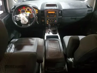 2012 Nissan Titan S with VIN 1N6AA0EC8CN322684, listed as a Copart auction lot 86419794 with 115,214 mi miles and Salvage Title. Bid and sale history available at DreamBid. Image 8.