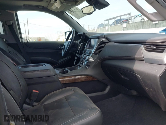 2020 Chevrolet Suburban LT with VIN 1GNSCHKC2LR229759, listed as a IAAI auction lot 42128257 with 46,138 mi miles and . Bid and sale history available at DreamBid. Image 5.