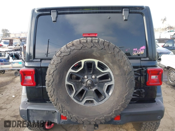 2020 Jeep Wrangler Unlimited Rubicon with VIN 1C4HJXFG1LW141335, listed as a IAAI auction lot 42724973 with 59,843 mi miles and . Bid and sale history available at DreamBid. Image 16.