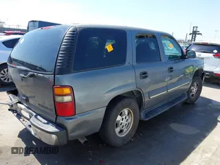 2002 Chevrolet Tahoe LS z VIN 1GNEC13V92R305304, wystawiony jako IAAI lot #41851210 z przebiegiem Nie podano mil oraz . Historia ofert i sprzedaży dostępna na DreamBid. Obrazek 4.