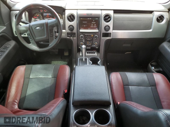 2014 Ford F-150 SVT Raptor with VIN 1FTFW1R60EFA69717, listed as a Copart auction lot 67408424 with 184,866 mi miles and Salvage Title. Bid and sale history available at carsss.com. Image 8.