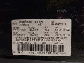 2005 Dodge Ram 3500 SLT with VIN 3D7LS38C85G810265, listed as a IAAI auction lot 41856058 with 164,027 mi miles. Bid and sale history available at carsss.com. Image 9.
