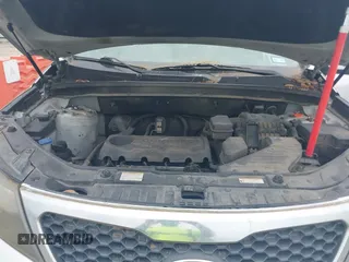 2012 Kia Sorento LX z VIN 5XYKT3A18CG201670, wystawiony jako IAAI lot #42305664 z przebiegiem 192 170 mil mil oraz . Historia ofert i sprzedaży dostępna na DreamBid. Obrazek 10.