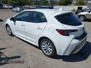 2023 Toyota Corolla Hatchback SE with VIN JTND4MBE8P3212249, listed as a IAAI auction lot 41882389 with 21,589 mi miles. Bid and sale history available at carsss.com. Image 3.