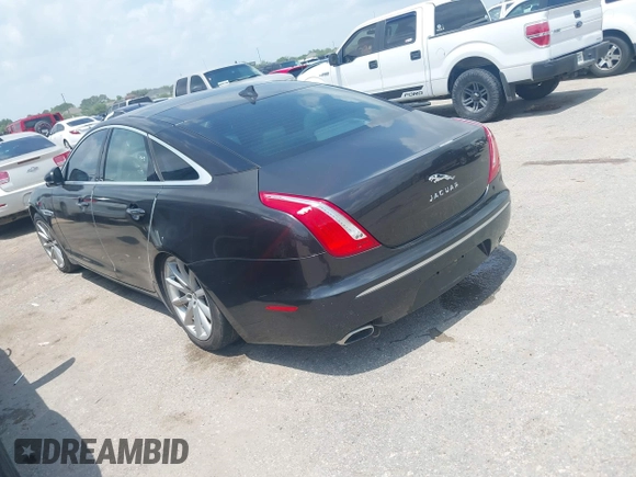 2013 Jaguar XJ with VIN SAJWA1C77D8V44610, listed as a IAAI auction lot 42150382 with Not Provided miles and . Bid and sale history available at DreamBid. Image 3.