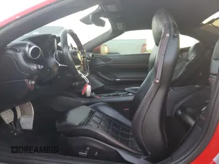 2019 Ferrari Portofino z VIN ZFF89FPA0K0242592, wystawiony jako Copart lot #74249014 z przebiegiem Nie podano mil oraz Nie do naprawy. Historia ofert i sprzedaży dostępna na DreamBid. Obrazek 7.