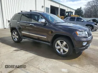 2011 Jeep Grand Cherokee Overland Summit with VIN 1J4RR6GT1BC617435, listed as a Copart auction lot 47730105 with 203,408 mi miles and Salvage Title. Bid and sale history available at carsss.com. Image 4.