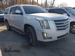 2015 Cadillac Escalade ESV Platinum z VIN 1GYS4UKJXFR663200, wystawiony jako IAAI lot #41688878 z przebiegiem 210 526 mil mil oraz . Historia ofert i sprzedaży dostępna na DreamBid. Obrazek 1.