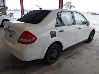 2010 Nissan Versa 1.8 S with VIN 3N1BC1AP7AL414885, listed as a IAAI auction lot 41484047 with 200,905 mi miles. Bid and sale history available at carsss.com. Image 4.