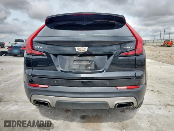 2020 Cadillac XT4 FWD Premium Luxury with VIN 1GYFZCR40LF073517, listed as a Copart auction lot 60121635 with 79,450 mi miles and Salvage title. Bid and sale history available at DreamBid. Image 6.