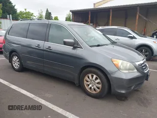 2010 Honda Odyssey EX-L z VIN 5FNRL3H74AB039775, wystawiony jako IAAI lot #42599253 z przebiegiem 207 372 mil mil oraz . Historia ofert i sprzedaży dostępna na DreamBid. Obrazek 1.