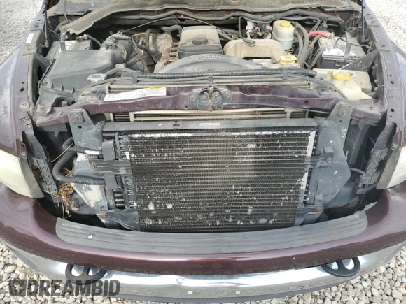 2004 Dodge 2500 SLT z VIN 3D7KU28C54G121413, wystawiony jako Copart lot #52992525 z przebiegiem 305 882 mil mil oraz Szkoda całkowita • Salvage title. Historia ofert i sprzedaży dostępna na DreamBid. Obrazek 11.