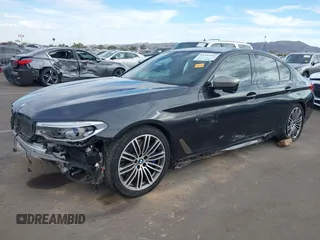 2019 BMW 5 Series M550i xDrive with VIN WBAJB9C51KB287797, listed as a IAAI auction lot 41549311 with 61,459 mi miles and . Bid and sale history available at DreamBid. Image 17.