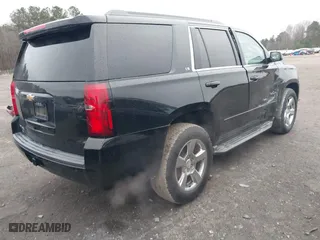 2016 Chevrolet Tahoe LS with VIN 1GNSKAKCXGR458352, listed as a IAAI auction lot 41541099 with 93,879 mi miles. Bid and sale history available at carsss.com. Image 4.