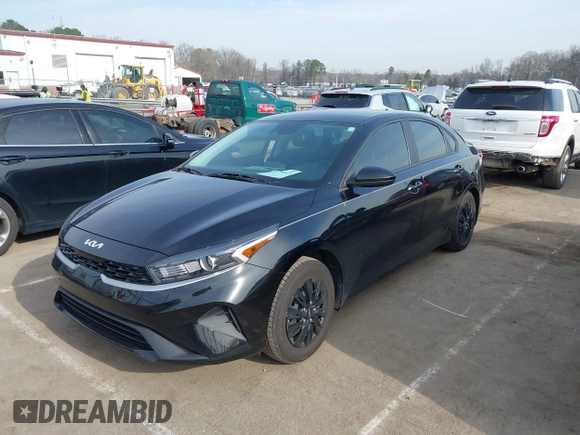 2023 Kia Forte LXS with VIN 3KPF24AD9PE551672, listed as a IAAI auction lot 41794626 with 24,257 mi miles and . Bid and sale history available at carsss.com. Image 2.