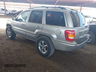 2002 Jeep Grand Cherokee Limited with VIN 1J8GW58J62C165942, listed as a IAAI auction lot 42739339 with 220,677 mi miles and . Bid and sale history available at DreamBid. Image 3.