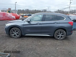 2017 BMW X1 xDrive28i with VIN WBXHT3Z39H4A57753, listed as a IAAI auction lot 41726790 with 52,509 mi miles. Bid and sale history available at carsss.com. Image 14.