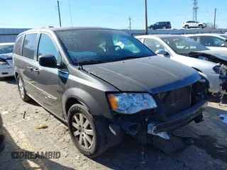 2016 Chrysler Town & Country Touring with VIN 2C4RC1BG4GR297286, listed as a IAAI auction lot 41333098 with 216,500 mi miles. Bid and sale history available at carsss.com. Image 1.