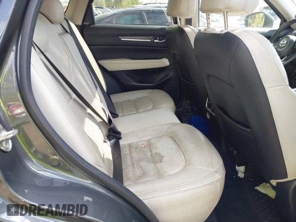 2019 Mazda CX-5 Grand Touring with VIN JM3KFBDM7K0619379, listed as a IAAI auction lot 42007107 with 209,590 mi miles. Bid and sale history available at carsss.com. Image 8.