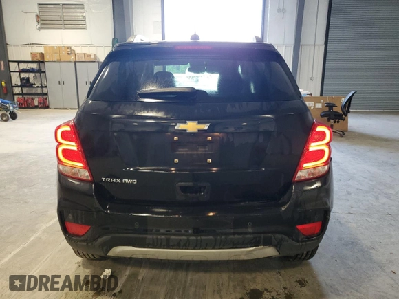 2022 Chevrolet Trax LT with VIN KL7CJPSMXNB533839, listed as a Copart auction lot 63217215 with 59,461 mi miles and Clean title. Bid and sale history available at DreamBid. Image 6.